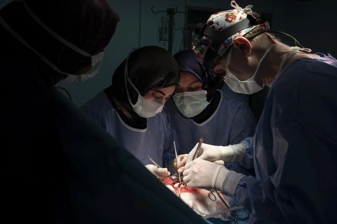 Dr. Vitaly Dedovich, right, of the Novick Cardiac Alliance medical team, performs open heart surgery at the Tajoura National Heart Center in Tripoli, Libya, on Feb. 26, 2020. (AP)