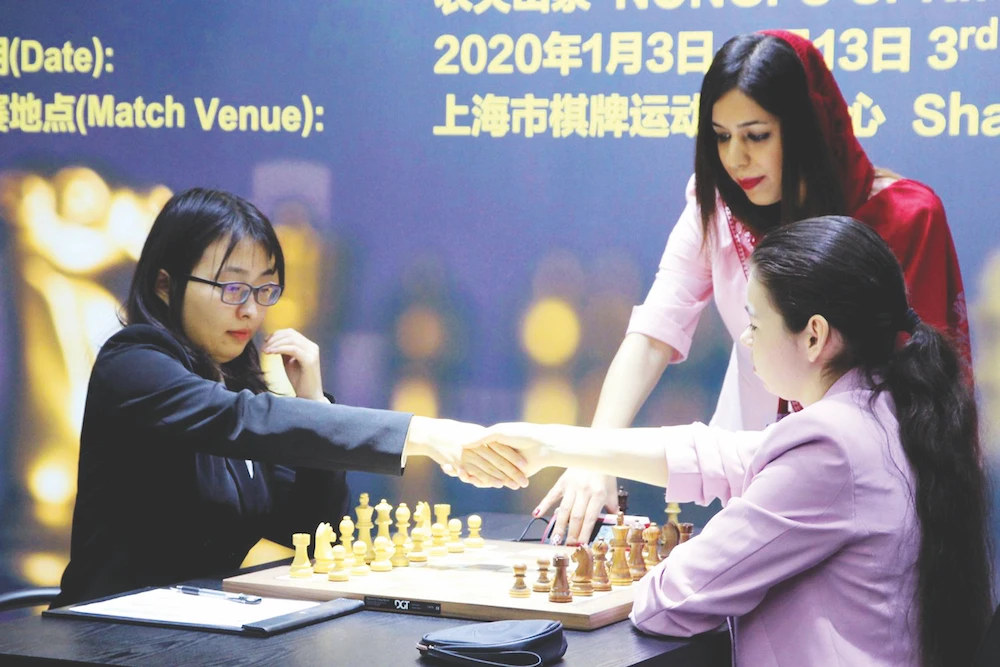 Controversy over loose-fitting hijab forces Iranian chess referee to claim asylum in UK