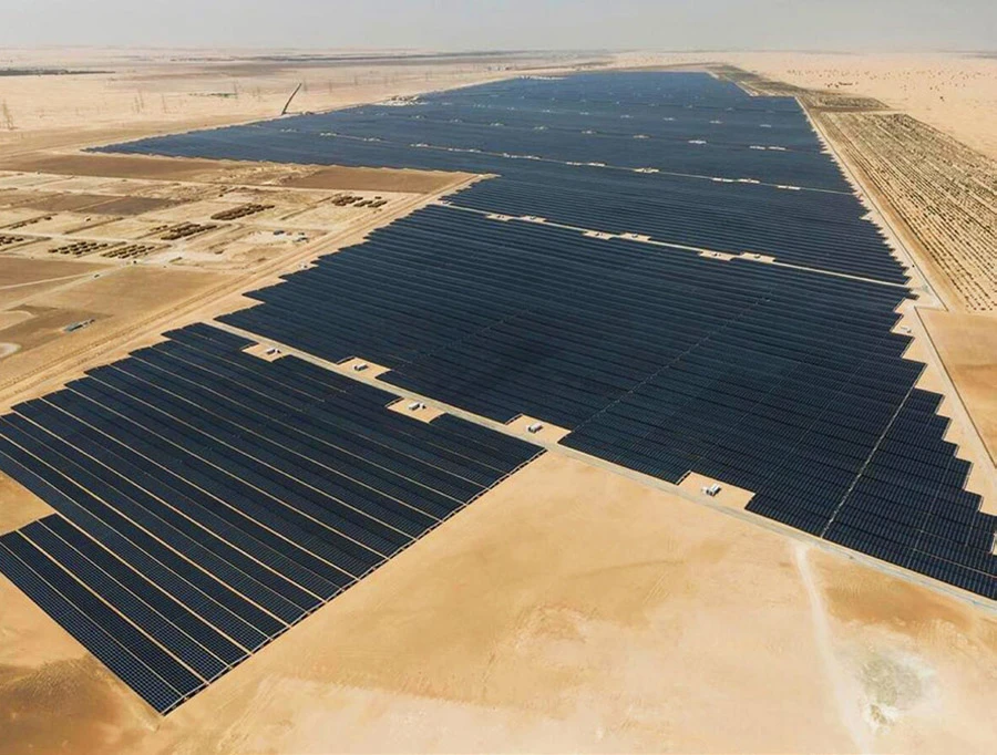 Noor Abu Dhabi, the world’s largest solar panel project, is part of the push towards a low-carbon world. (AFP)
