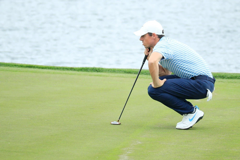 Rory McIlroy of Northern Ireland putts on the 17th green during a practice round prior to The PLAYERS Championship on The Stadium Course at TPC Sawgrass on March 10, 2020 in Ponte Vedra Beach, Florida. (Cliff Hawkins/Getty Images/AFP)