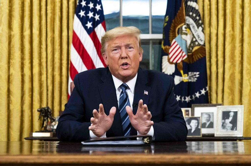 US President Donald Trump said there would be exemptions for ‘Americans who have undergone appropriate screenings.’ (AFP)