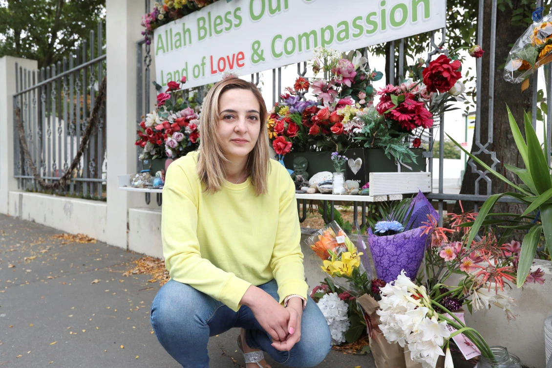 Flowers and messages of support adorn NZ mosque for shooting anniversary