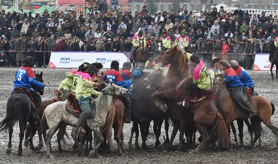 Kabul stadium to watch horsemen play polo with a headless goat carcass in Afghanistan’s first buzkashi league on Thursday. (Photo via AFP)