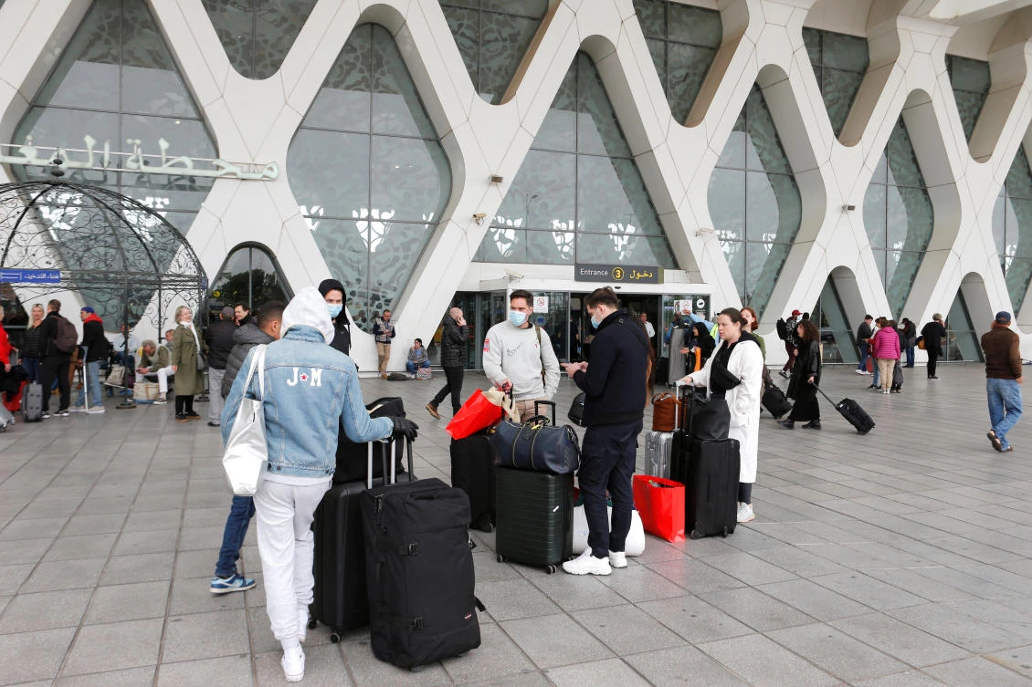 Tourists wait to be repatriated to their countries as Morocco suspends flights to European countries over coronavirus (COVID-19) fears, at Marrakech airport, Morocco. (Reuters)