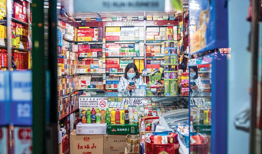 US-China trade truce at risk as virus hits global economy