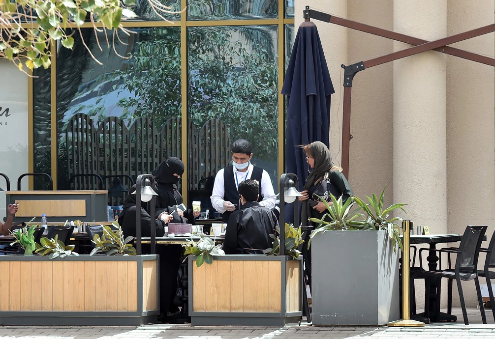 Businesses who exploit the coronavirus crisis by jacking up prices of goods and services face severe penalties, the Saudi Public Prosecution has warned. (AFP / FAYEZ NURELDINE)