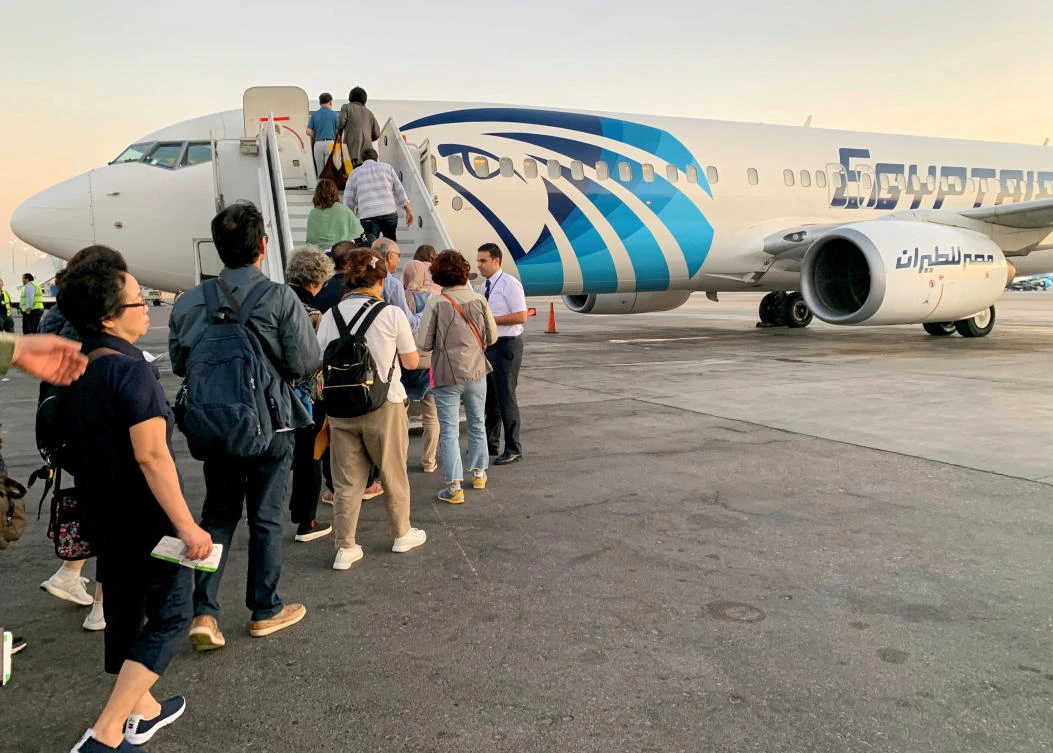 Tourists take Luxor-bound EgyptAir flight from Cairo International Airport in Cairo, Egypt October 9, 2019. Picture taken October 9, 2019. (Reuters)