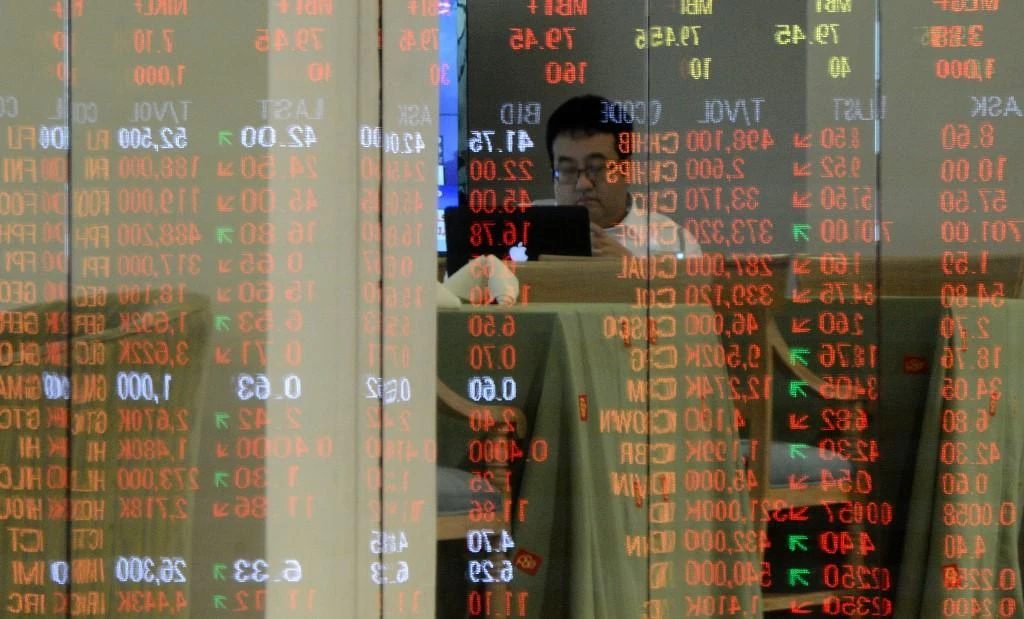 The Philippine Stock Exchange said trade was suspended until further notice ‘to ensure the safety of employees and traders.’ (AFP)