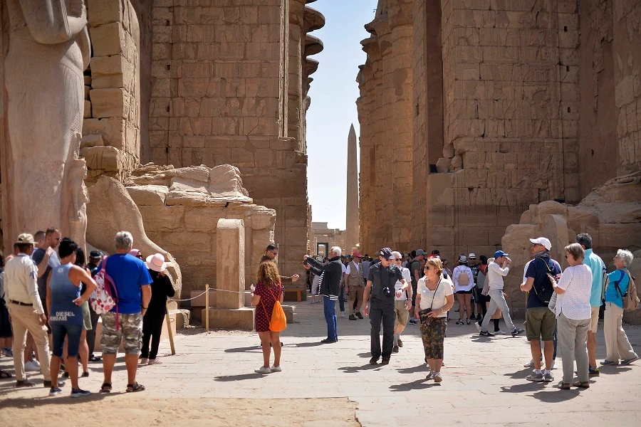 Tourists visit the Karnak Temple Complex in Egypt's southern city of Luxor, on March 8, 2020. (File/AFP)