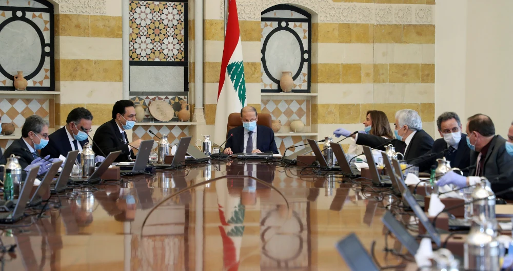 President Michel Aoun on Thursday presided over a Lebanese Cabinet session wearing a face mask. (AP)