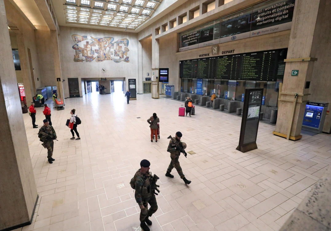 Soldiers patrol central station before Belgium imposes a lockdown to slow down the spread of the coronavirus disease in Brussels. (Reuters)