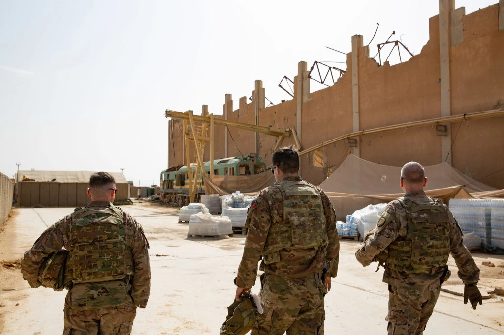 US Brig. Gen. Vincent Barker (R) touring the US base in Qaim, as troops prepare for redeployment. (AFP)