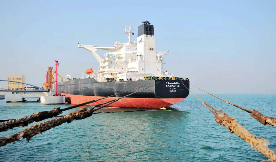 This photo taken on March 20, 2020 shows a Kuwaiti oil tanker unloading crude oil at the port in Qingdao, in China's eastern Shandong province. (AFP)
