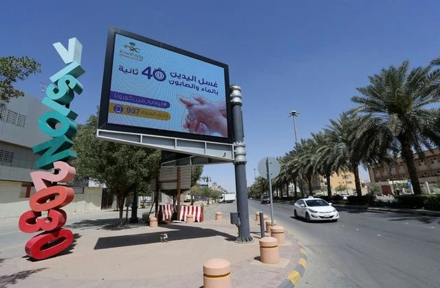 A banner with an instruction on personnel hygiene is seen at the street, following the outbreak of coronavirus, in Riyadh, Saudi Arabia, March 16, 2020. The banner reads: "Wash hands with soap and water." (Reuters)