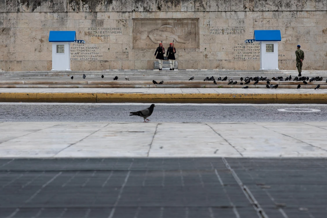 Presidential Guards in front of the Tomb of the Unknown Soldier, after the Greek government imposed a nationwide lockdown to contain the spread of the coronavirus (COVID-19), in Athens. (Reuters)