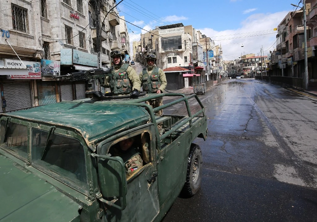 Jordan went into an unprecedented lockdown March 18, a day after King Abdullah II issued a decree activating Defense Law No. 13. (AFP)