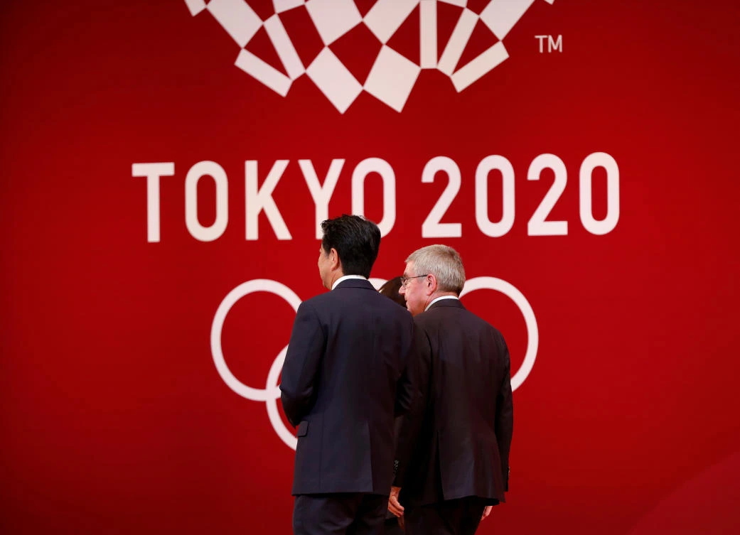 International Olympic Committee President Thomas Bach walks with Japan’s Prime Minister Shinzo Abe during the ‘One Year to Go’ ceremony celebrating one year out from the start of the summer games on July 24, 2019. (Reuters)