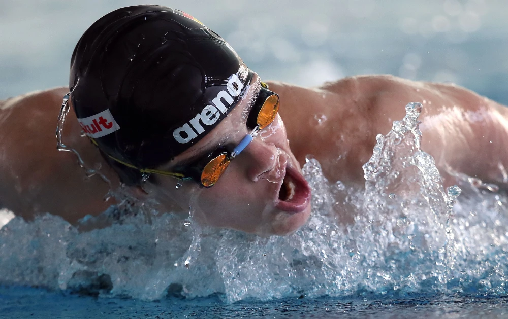 German olympian Franziska Hentke trains at the Federal Base of the German Swimming Association (DSV) in Magdeburg, Germany, on March 24, 2020. (AFP / Ronny Hartmann)