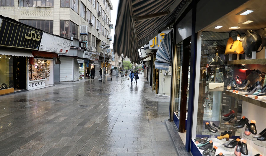 A mostly empty street is seen in a commercial district in downtown Tehran, Iran, Sunday, March 22, 2020. (AP)