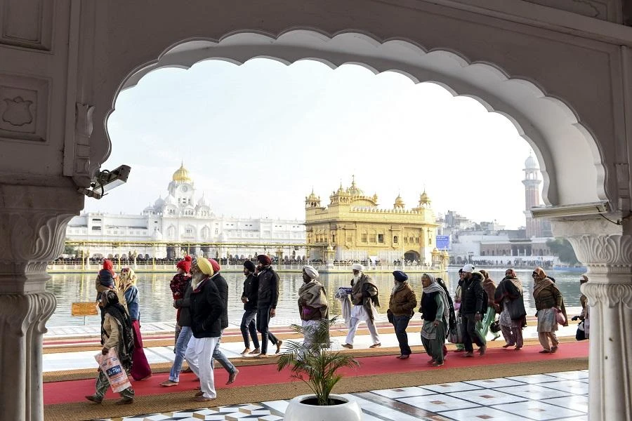Sikh devotees arrive to pay respect on the occasion of Sikh 'Maghi Mela' festival, following the Lohri or harvest festival, at the Golden Temple in Amritsar on January 14, 2020. (File/AFP)