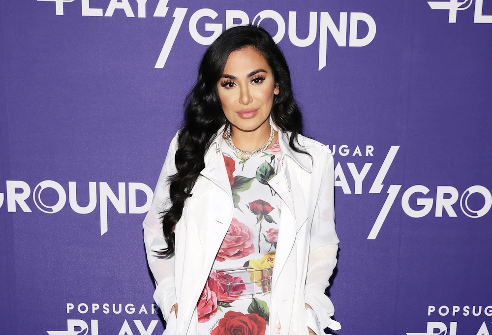 Huda Kattan has pledged to donate $100,000 to be split between 100 different freelance makeup artists. (File/Getty)