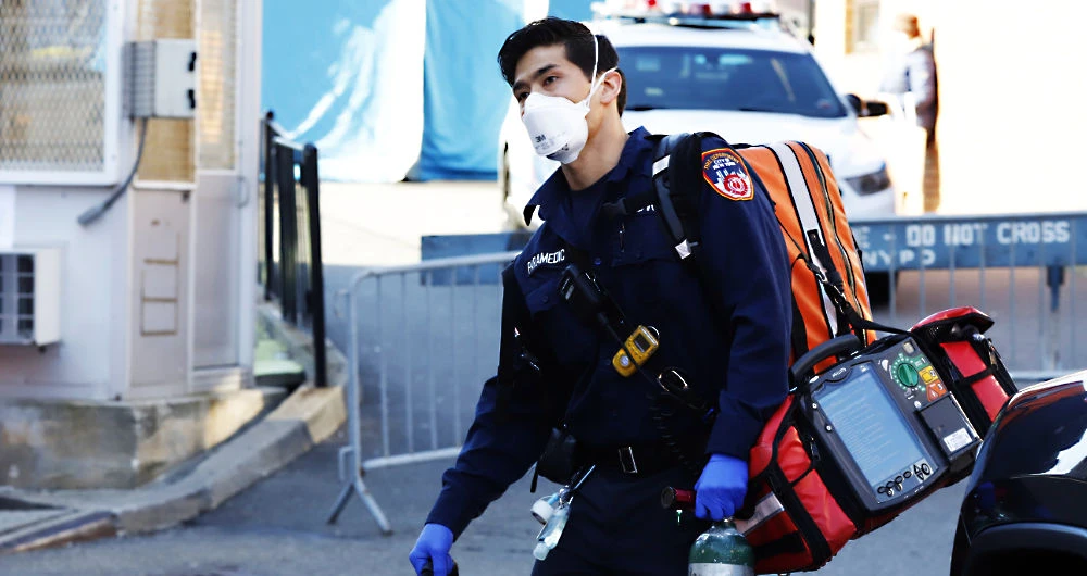 An emergency medical technician outside Elmhurst Hospital Center in the Queens borough of New York City. (Reuters)