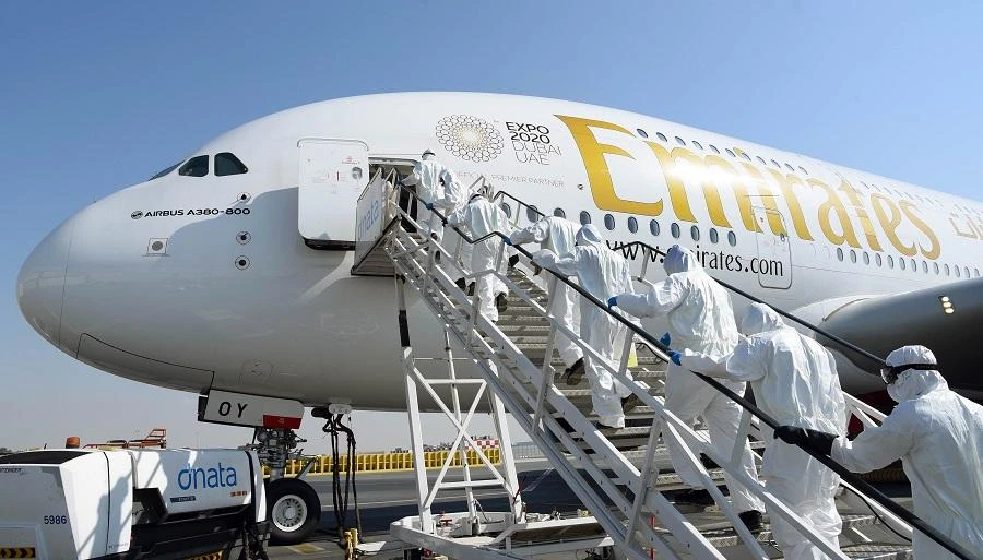 Dubai’s Emirates Airline, the largest carrier in the region and one of the world’s biggest, slashed staff salaries by between 25 percent and 50 percent for three months. (File/AFP)
