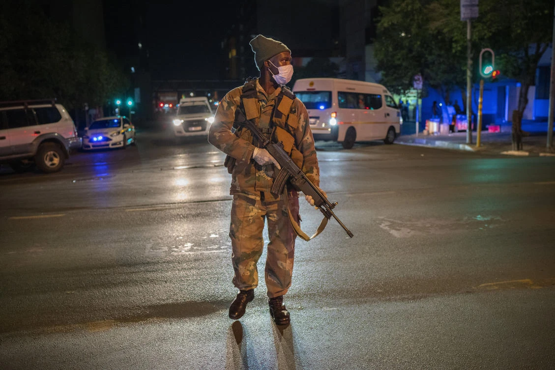 South Africa’s military was helping to enforce measures that include bans on sales of cigarettes and alcohol, even dog-walking. (AP)