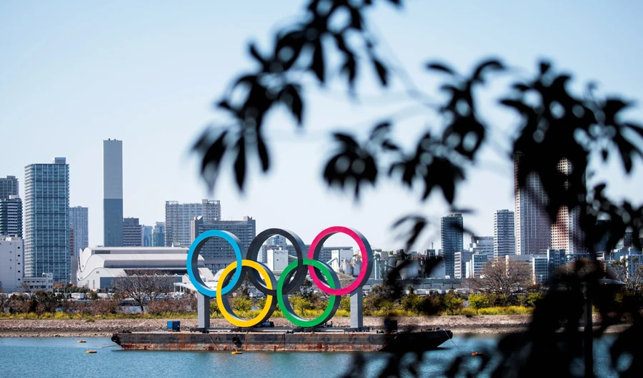 The Olympic rings are seen in Tokyo's Odaiba district on March 25, 2020, the day after the historic decision to postpone the 2020 Tokyo Olympic Games. (AFP)
