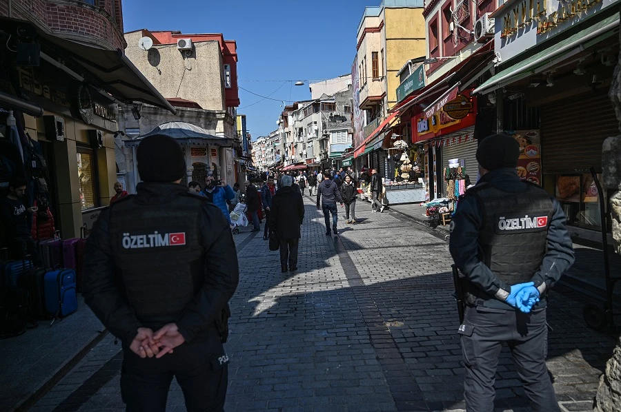 Turkish anti riot police officers guard the entrance to Fatih Mosque at Friday prayer time as all mosques are closed to prevent the spread of the COVID-19 pandemic caused by the novel coronavirus, on March 20, 2020 in Istanbul. (File/AFP)
