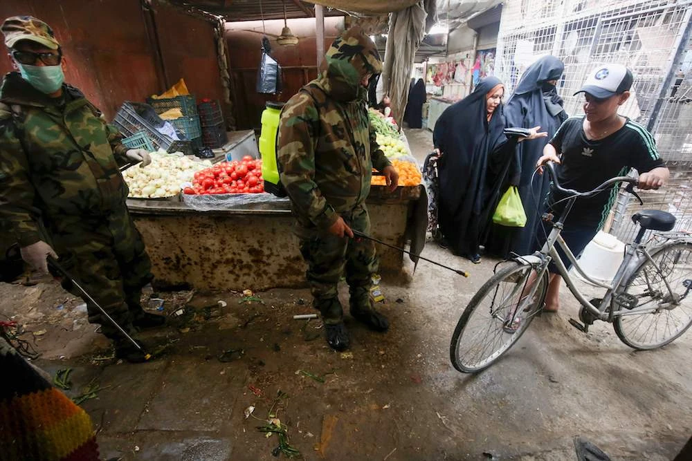 Governments in the Middle East are taking more precautionary measures, including extending stay-at-home campaigns, in a bid to stop the continuoud rise of coronavirus infections. (AFP)