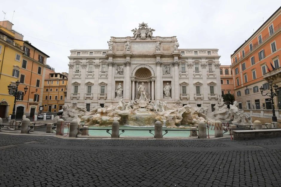 Many visitors to Rome will have tossed a coin over their shoulder into the Trevi Fountain, as legend has it that this means one day they will return to the Eternal City — coronavirus has stopped that. (Reuters/File Photo)