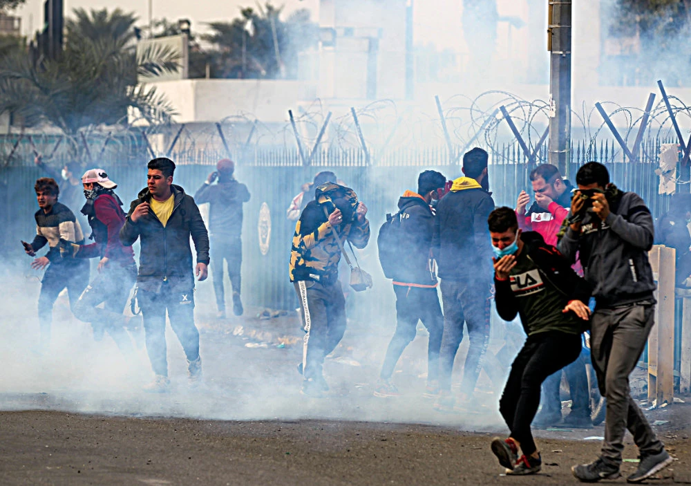 Anti-government demonstrations erupted in Baghdad on Oct. 1 over a lack of jobs, poor public services and corruption. Protesters have long-demanded a snap election, putting added pressure on the beleaguered government. (AFP)