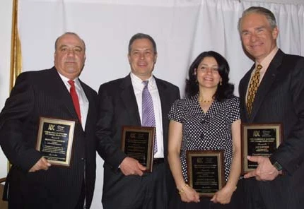 Mansour Tadros, left, joined Daily Herald Newspaper columnist Burt Constable, American Arab journalist Amani Ghouleh, and WBBM TV Reporter Jay Levin in receiving ADC’s 'Excellence in Journalism' Award in Chicago in 2010. (Photo by Ray Hanania)