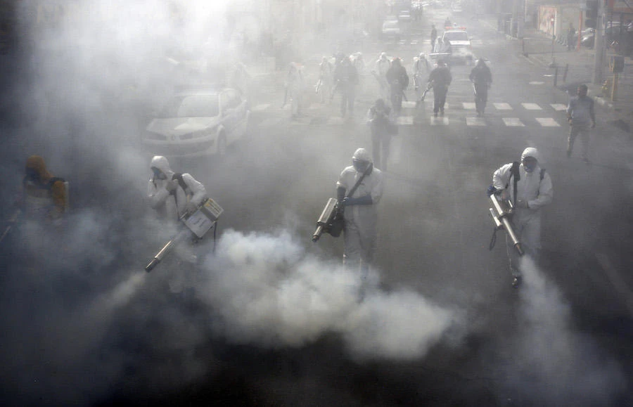 There is no official lockdown within Iran’s cities, although the government has repeatedly urged Iranians to stay at home to contain the spread of the virus. (File/AFP)
