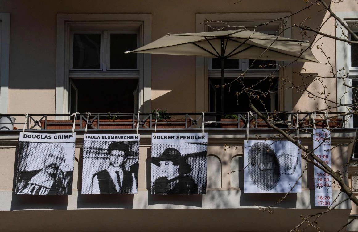 An art installation, part of the "Balconies, Life, Art, Pandemic, and Proximity" exhibition is seen in Berlin on April 12, 2020, amid a new coronavirus COVID-19 pandemic. Over 30 artists are taking part in the two-day exhibition which calls on "the artistic community living in [Berlin's district of] Prenzlauer Berg to activate / exhibit / inhabit / their windows and balconies on Easter Sunday and Monday". Curated by Ovul Durmusoglu and Joanna Warsza, the exhibition boasts "zero budget, no openings, no crowds, just a proposition of a stroll that would connect dots in solidarity and togetherness". / AFP / John MACDOUGALL