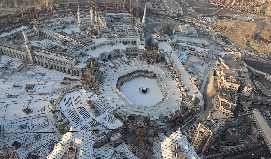 In this file photo, an aerial view shows an empty white-tiled area surrounding the Kaaba in Makkah's Grand Mosque on March 6, 2020. (AFP)