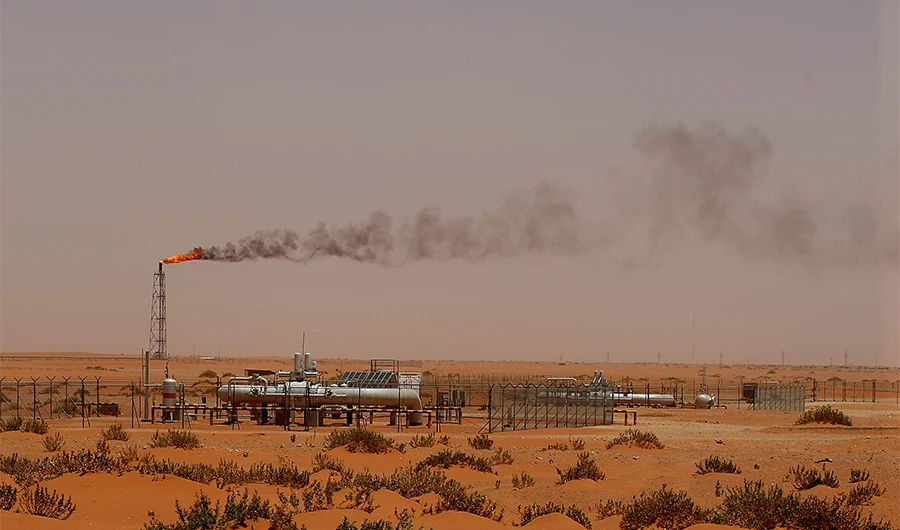 A flame from a Saudi Aramco oil installion known as "Pump 3" is seen in the desert near the oil-rich area of Khouris, 160 kms east of the Saudi capital Riyadh, on June 23, 2008. (AFP)