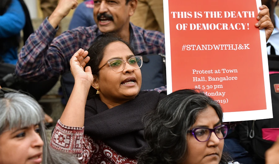 Protestors and activists belonging to the Alternative Law Forum and other left wing organisations take part in a protest in Bangalore on August 5, 2019, in reaction to the Indian government scrapping Article 370 that granted a special status to Jammu and Kashmir. (AFP)