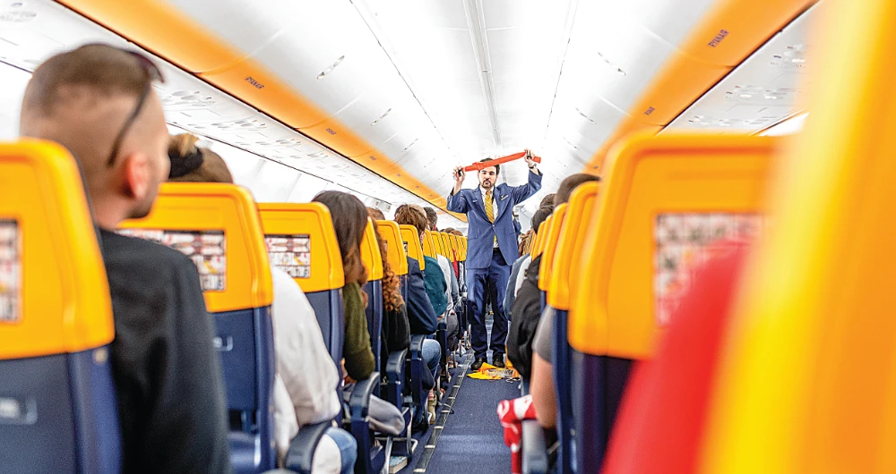 Ryanair has frozen recruitment and cut pay by 50 percent. (Shutterstock)