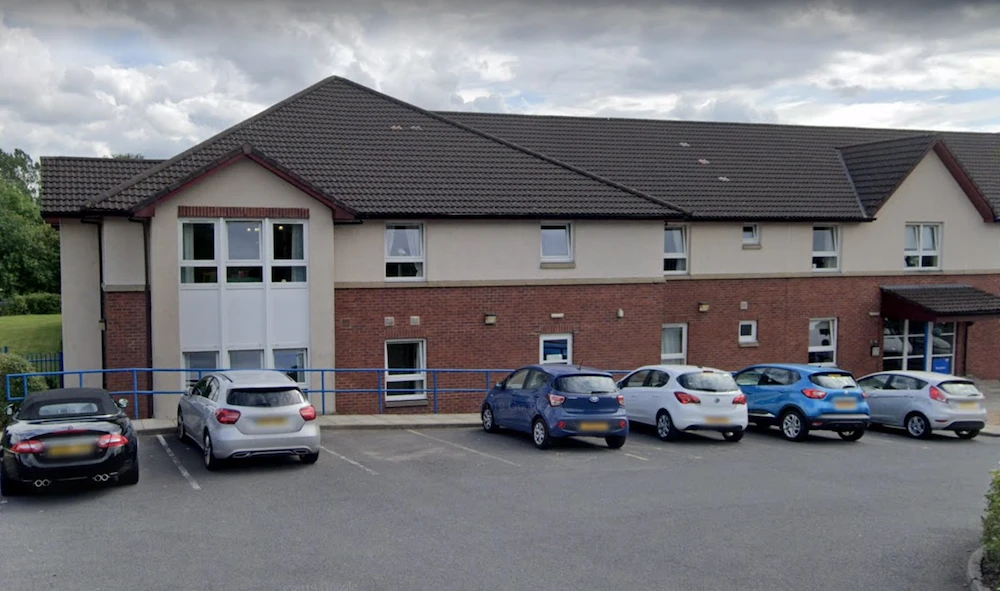 Two workers at the the Burlington Court care home in Glasgow are being treated for the illness. (Google Street View)