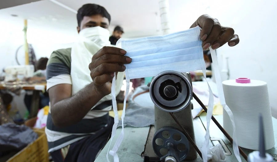 A factory in Sharjah, UAE produces masks amid the outbreak. (File/AFP)