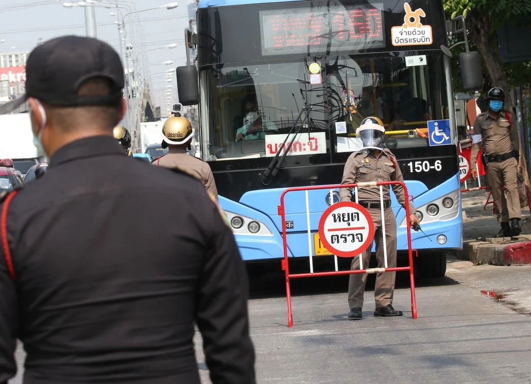 Thai police officers check inter-provincial travelers, after citizens were asked not to travel between provinces in an effort to stop coronavirus from spreading. Thailand’s tally stands at 2,258 infections and 27 death. (EPA)