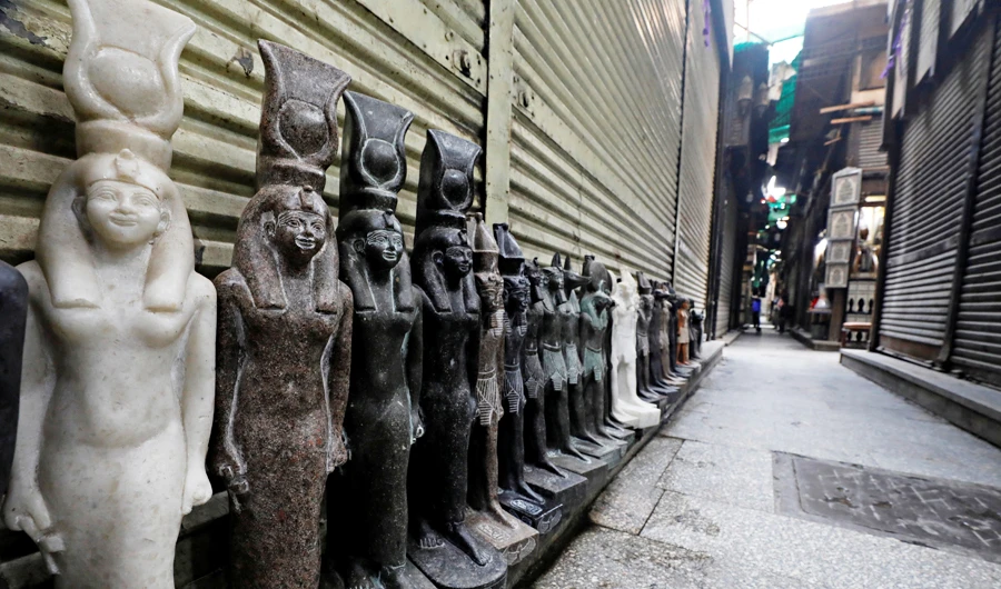 Closed shops are seen at a popular tourist area in Cairo. (Reuters)