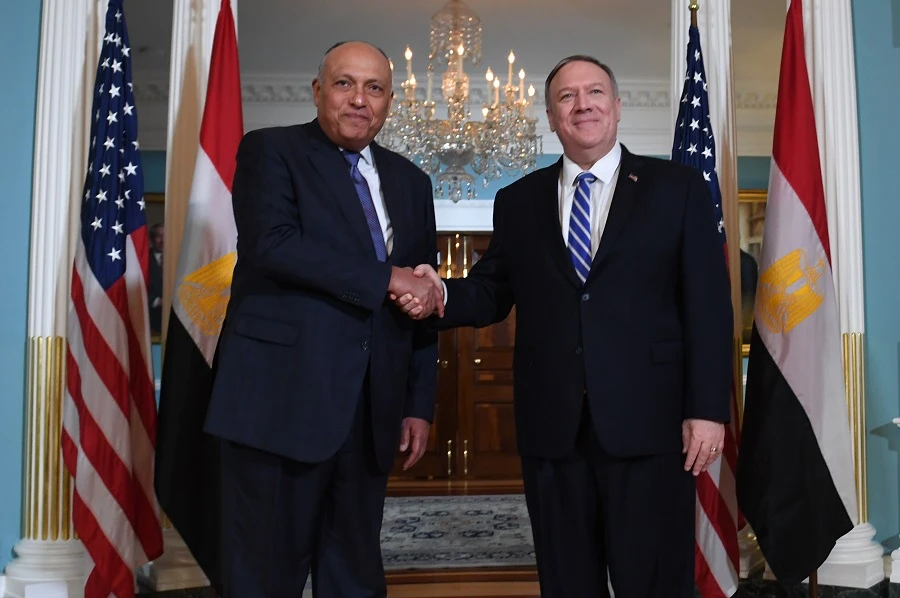 US Secretary of State Mike Pompeo(R) meets with Egyptian Foreign Minister Sameh Shoukry, at the Department of State on December 9, 2019 in Washington, DC. (File/AFP)