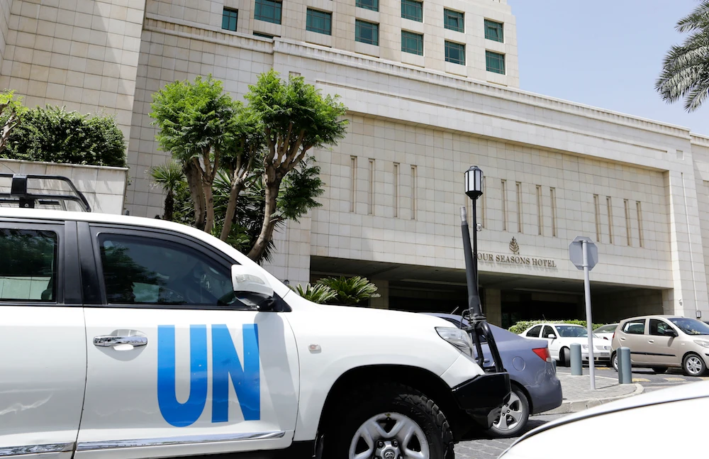 An United Nations vehicle is seen outside the hotel where the international experts from the Organization for the Prohibition of Chemical Weapons (OPCW) are staying in Damascus on April 18, 2018. (File/AFP)