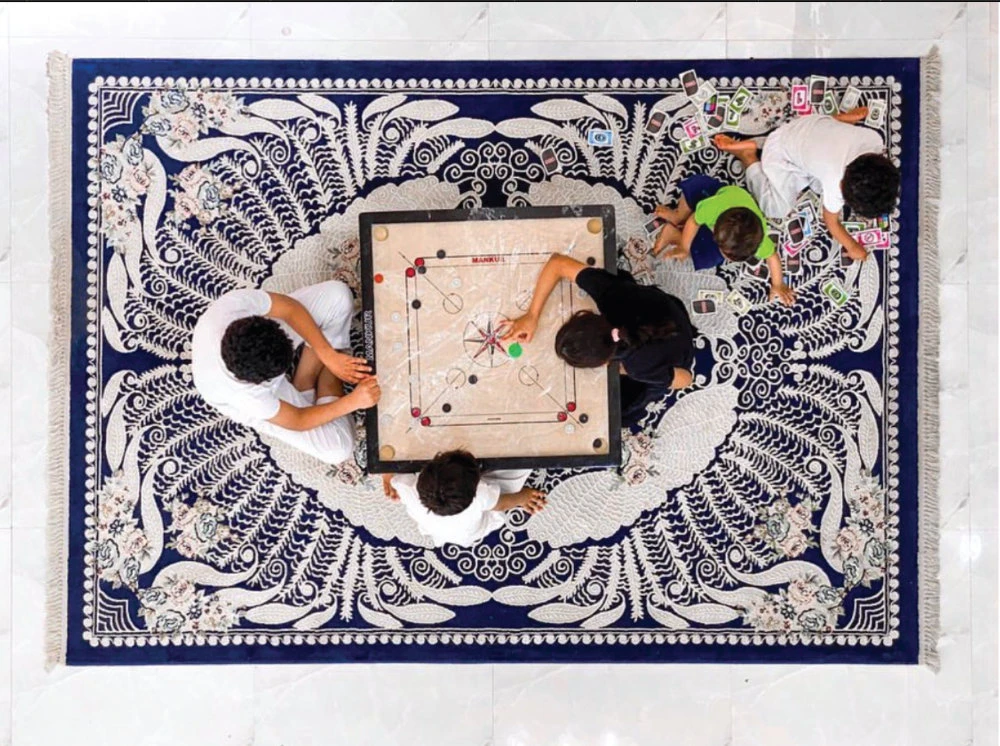 For many Saudi families, there is no better way to stay entertained than by playing a board game that both old and young enjoy. (Photo by Rashid/Instagram:@irashedz)