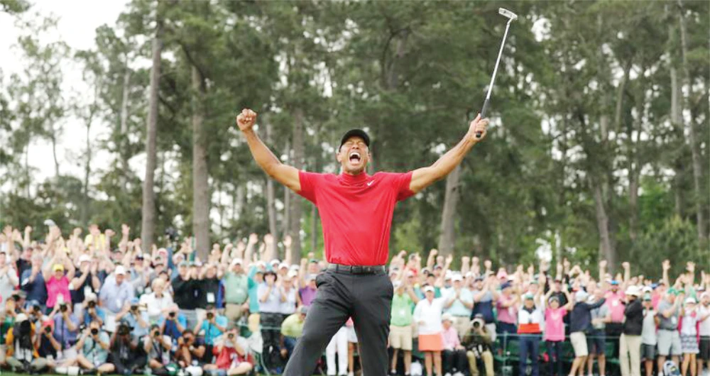 Tiger Woods celebrates after winning the Masters at Augusta National last year. (Files/Reuters)