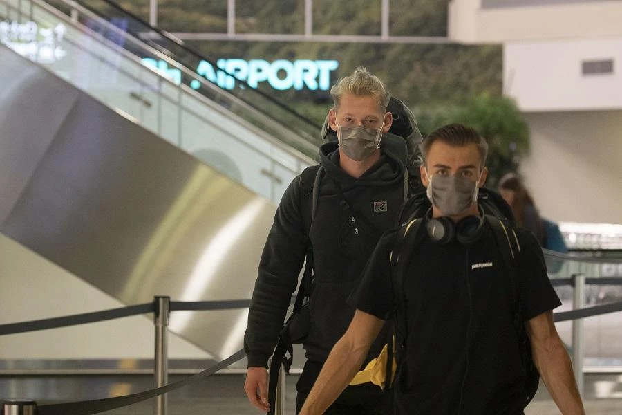 German tourists arrive to check in before taking a special flight for Frankfurt at Christchurch Airport in Christchurch on April 8, 2020. (File/AFP)