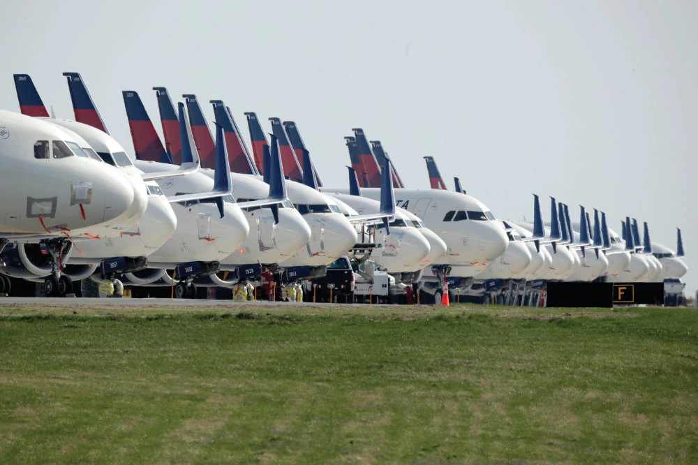 Several dozen mothballed Delta Air Lines jets at Kansas City International Airport in Kansas City, the US. The number of Americans getting on airplanes has sunk to a level not seen in more than 60 years as people shelter in their homes to avoid catching or spreading the coronavirus. (AP)